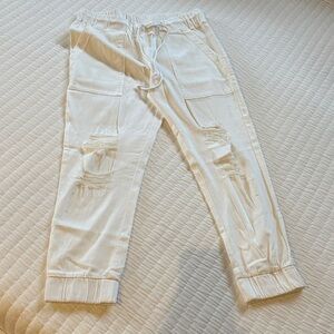 Boutique distressed, elastic drawstring, cinched bottom pant